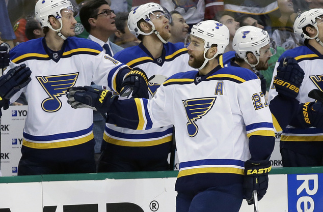 St. Louis Blues defenseman Alex Pietrangelo celebrates his goal with the bench during the first period of Game 7 of the NHL hockey Stanley Cup Western C