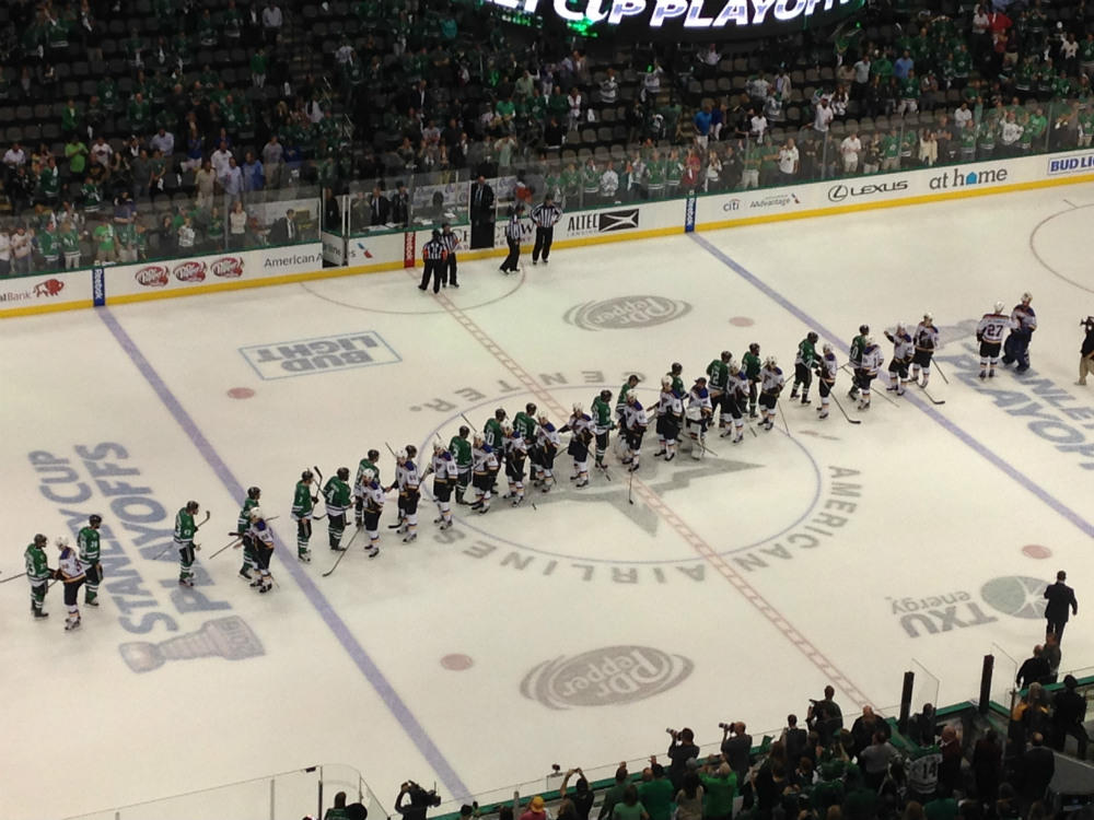 Stars and Blues players line up in the traditional hand shake at the end of the game. It was game 7 of the series in the second round of the Stanley Cup playoffs