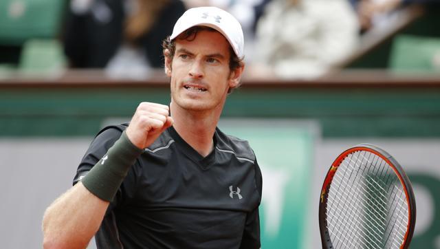 Britain's Andy Murray clenches his fist as he plays Radek Stepanek of the Czech Republic