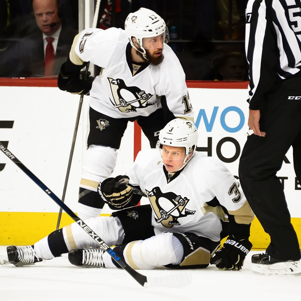 20160430pdPenguinsSports12 The Penguins&#39 Olli Maatta has trouble getting up after a big hit by the Capitals&#39 Brooks Orpik in the first period Saturday at the Verizon Center