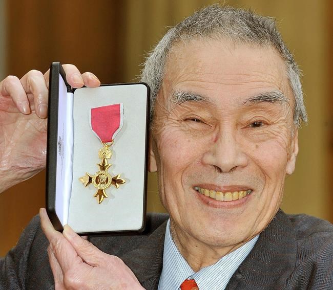 2011 Burt Kwouk poses after being presented with an Order of the British Empire award in London. The actor best known for playing Inspector Clouseau's manservant Cato in the Pink Panther films has die