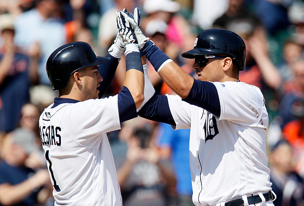 DETROIT MI- MAY 22 Victor Martinez #41 of the Detroit Tigers is congratulated by Jose Iglesias #1 after hitting a two-run home run against the Tampa Bay Rays during the eighth inning at Comerica Park