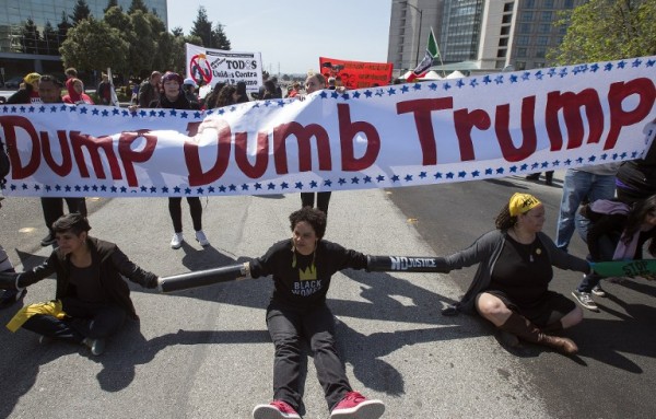 Tense protests outside Trump speech in California