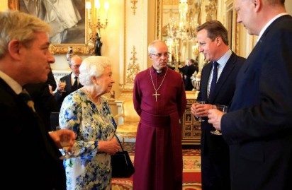 Cameron talking to Queen of England and others