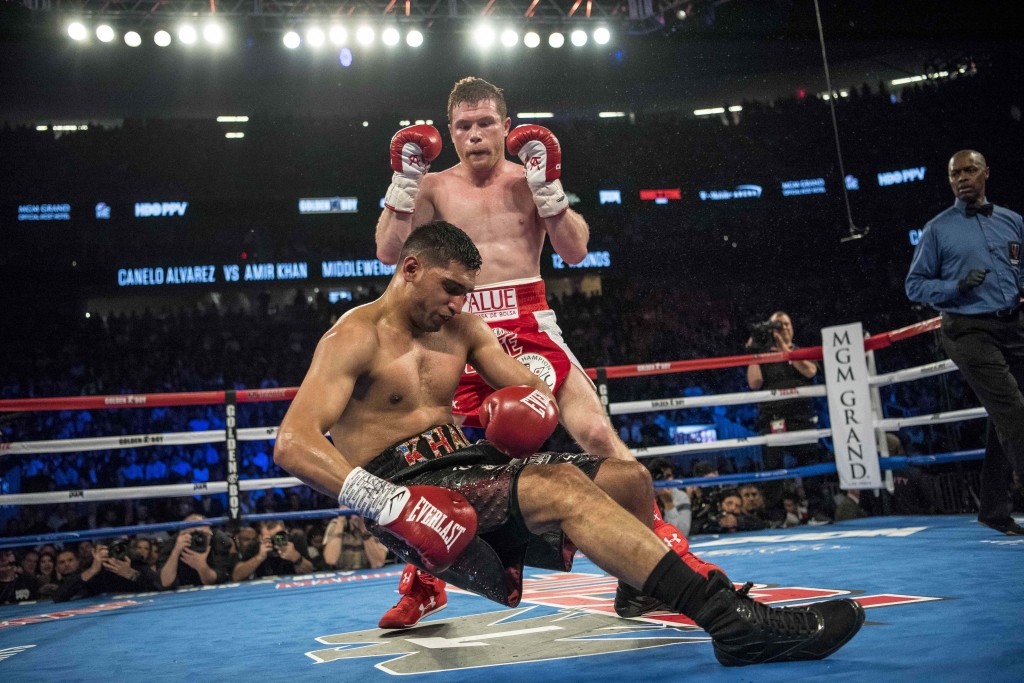 Las Vegas NV USA Canelo Alvarez knocks out Amir Khan during their middleweight boxing title fight at T Mobile Arena. Mandatory Credit Joshua Dahl-USA TODAY Sports