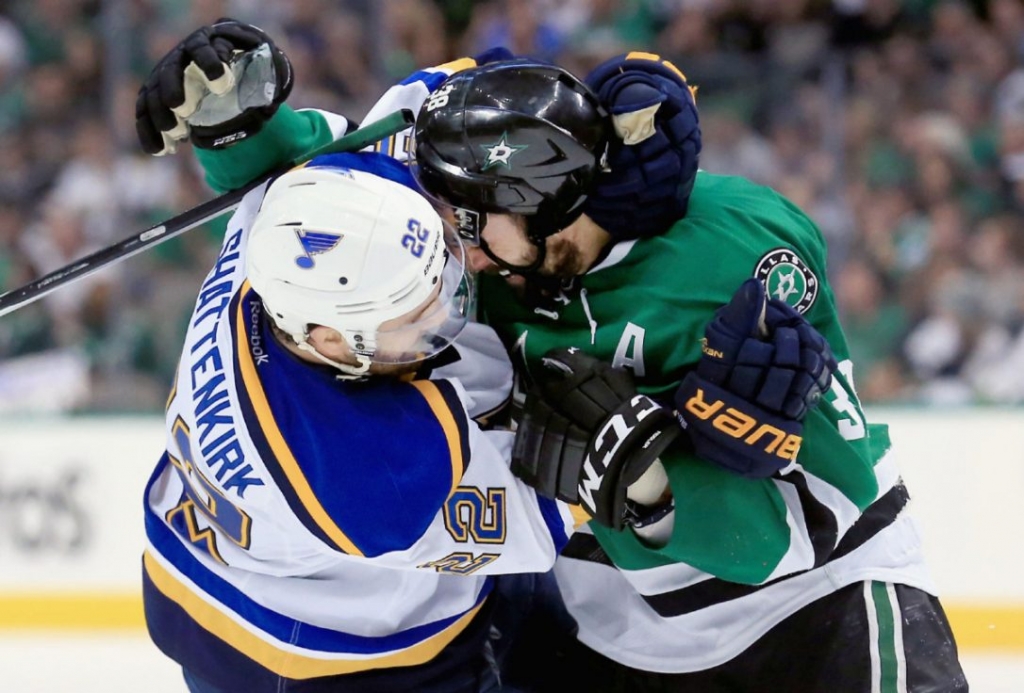 The Blues&#x27 Kevin Shattenkirk and Dallas&#x27 Vernon Fiddler exchange unpleasantries during Game 5 play Saturday afternoon in Dallas