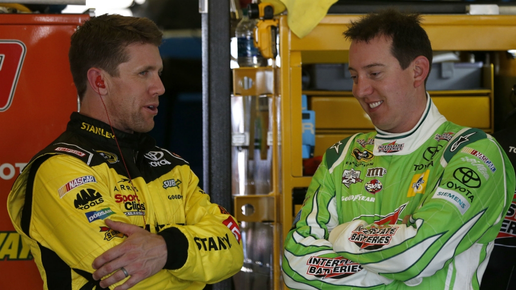 Carl Edwards left and Kyle Busch