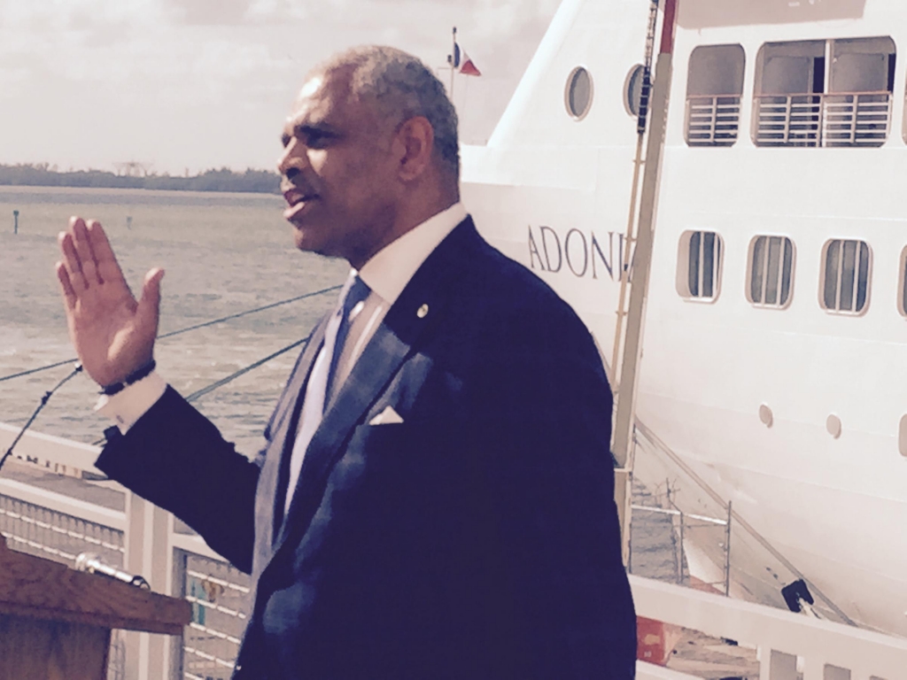 Carnival CEO Arnold Donald speaking to media Sunday in front of The Adonia cruise ship before its departure for Cuba