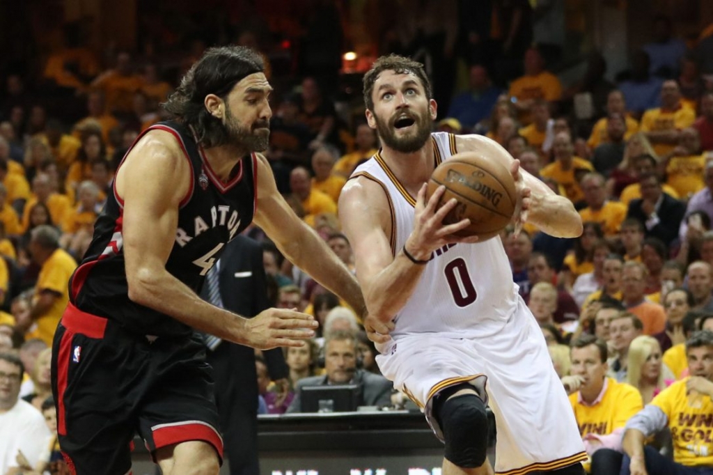 Kevin Love drives past Luis Scola as the Toronto Raptors lose the Cleveland Cavaliers in game 5 of the NBA Conference Finals at Quicken Loans Arena in Clevelan on Wednesday