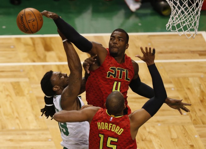 Apr 28 2016 Boston MA USA Boston Celtics forward Jae Crowder shoots the ball against Atlanta Hawks forward Paul Millsap and center Al Horford during the first half in game six of the first round of the NBA Playoffs at TD Garden. Mandato