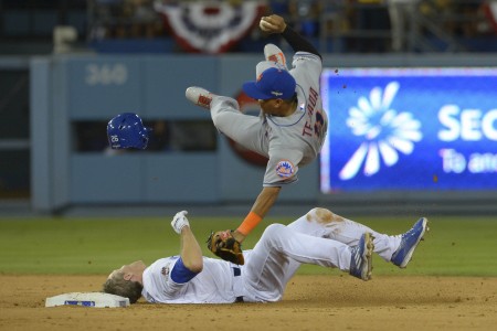 Oct 10 2015 Los Angeles CA USA New York Mets shortstop Ruben Tejada collides with Los Angeles Dodgers second baseman Chase Utley at second base during the seventh inning in game two of the NLDS at Dodger Stadium. Mandatory Credit Jayne Kam