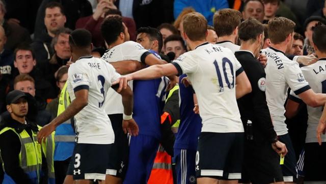 Chelsea's Diego Costa clashes with Tottenham's Mousa Dembele after the match