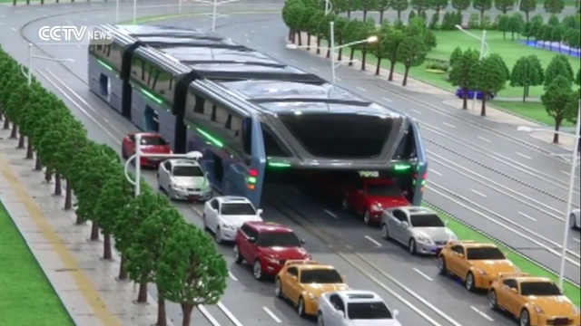 Watch this straddle bus eat cars as it speeds down the highway