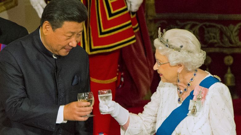 Chinese President Xi Jinping with Queen Elizabeth II at a state banquet at Buckingham Palace London during the first day of his state visit to Britain. Tuesday