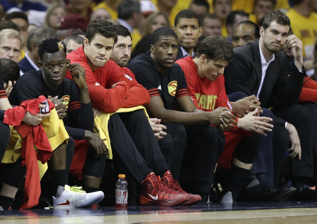 Atlanta Hawks players watch from the bench against the Cleveland Cavaliers in the first half during Game 2 of a second-round NBA basketball playoff series Wednesday