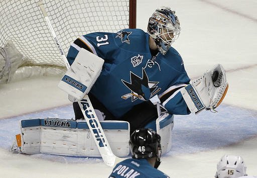 San Jose Sharks goalie Martin Jones makes a save on a shot from the Nashville Predators during the first period of Game 7 of an NHL hockey Stanley Cup Western Conference semifinal playoff series Thursday