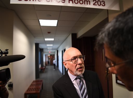 Marc Bern attorney for the shooting victims speaks to the media at Arapahoe County Justice Center in Centennial Thursday