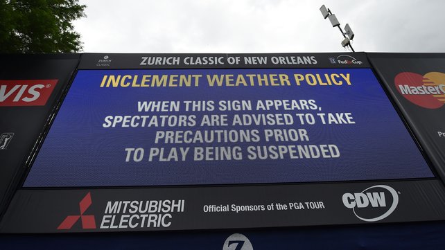 Inclement weather signs are posted along the course during the third round of the Zurich Classic