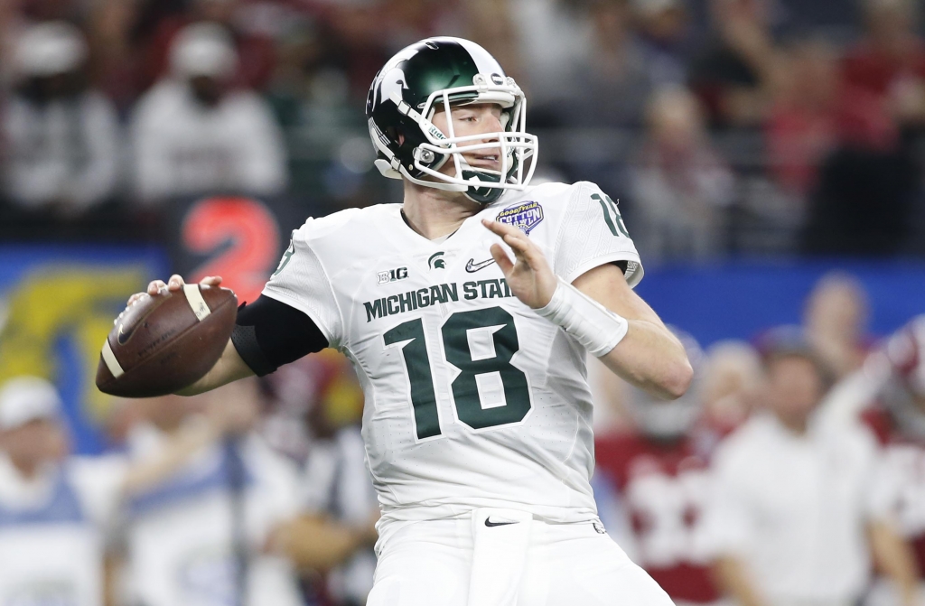 Raiders trade up in fourth round, select Connor Cook