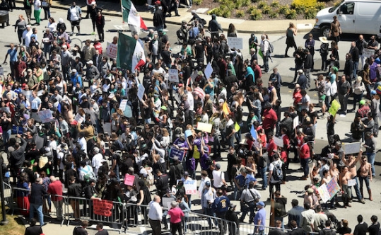 Demonstrators against U.S. Republican presidential candidate Donald Trump gather outside the Hyatt hotel where Trump is set to speak at the California GOP convention in Burlingame California