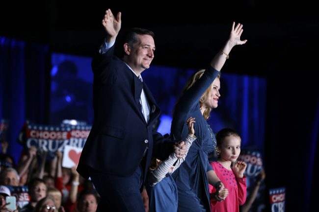 Republican presidential candidate Sen. Ted Cruz R-Texas waves with his wife Heidi and daughters Caroline right and Catherine during a rally at the Indiana State Fairgrounds in Indianapolis Monday