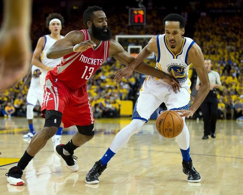 Golden State Warriors guard Shaun Livingston controls the ball against Houston Rockets guard James Harden during the third quarter in game five of the first round of the NBA Playoffs at Oracle Arena. Kelley L Cox-USA TODAY Sports