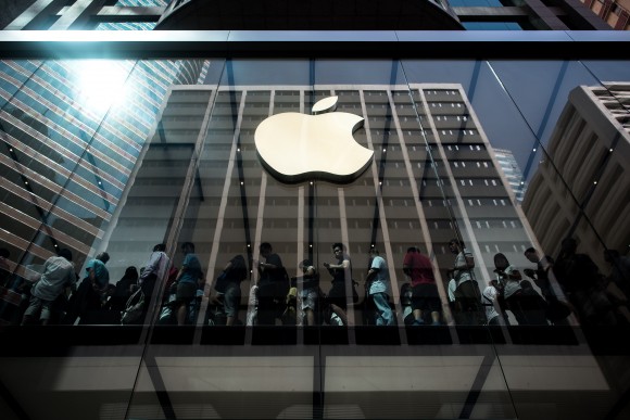 Customers queue inside an Apple store in Hong Kong on Sept. 25 2015