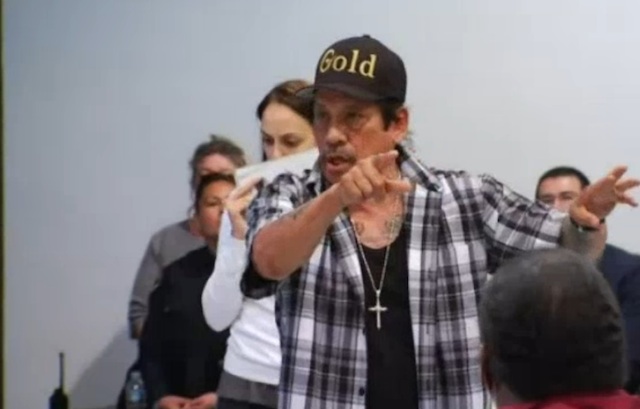 Danny Trejo speaks at a community meeting for Sylmar High School