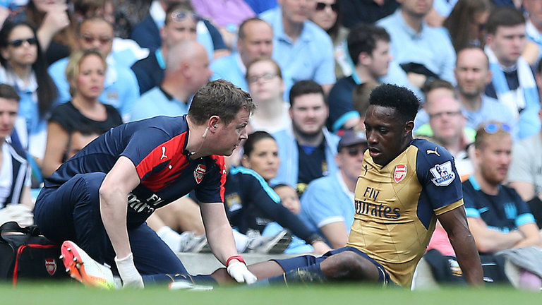 Danny Welbeck lays injured at the Etihad Stadium