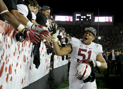 Joshua Garnett #51 of the Stanford Cardinal celebrates with the fans after Stanford defeated the Iowa Hawkeyes 45-16 in the 102nd Rose Bowl Game