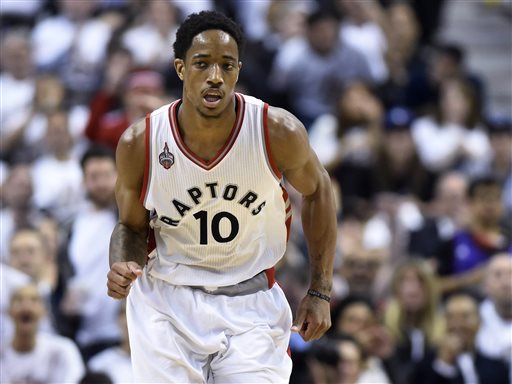 Toronto Raptors De Mar DeRozan runs up the court after making a 3-point basket against the Miami Heat during the second half of Game 5 of the NBA basketball Eastern Conference semifinals Wednesday