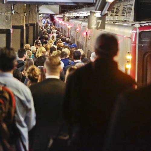 New York. Commuters into and out of terminal faced delays a day after a fire broke out beneath elevated train tracks in the city. (AP