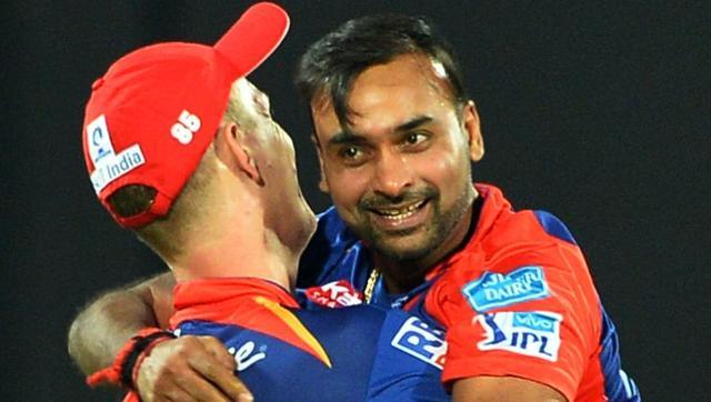 Delhi Daredevils Amit Mishra celebrates with teammates after dismissing Mumbai Indians Jos Buttler