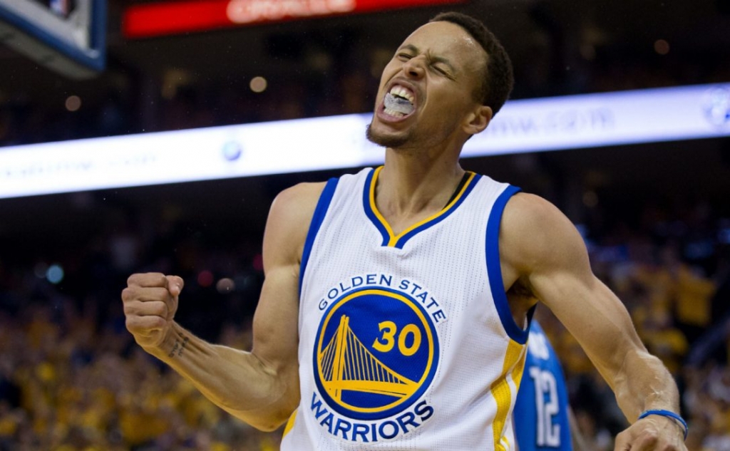 Warriors guard Stephen Curry reacts after draining a field goal in a season-saving 120-11 win over the Thunder in Game 5