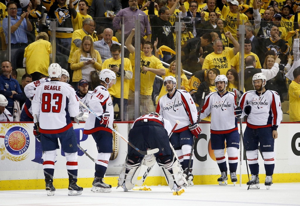 PITTSBURGH PA- MAY 10 Braden Holtby #70 of the Washington Capitals reacts after losing to the Pittsburgh Penguins in overtime 4-3 in Game Six of the Eastern Conference Second Round during the 2016 NHL Stanley Cup Playoffs at Consol Energy Center on Ma