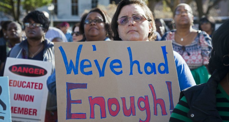 Lansing Michigan- Teachers and other school workers from Detroit rallied at the state capitol to oppose health care and other concessions demanded by the school district manager. The Detroit Public Schools have been run by state-appointed emergency mana