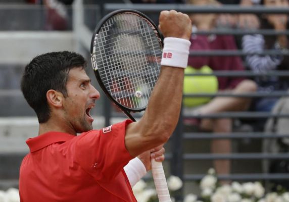 Novak Djokovic of Serbia celebrates after winning the