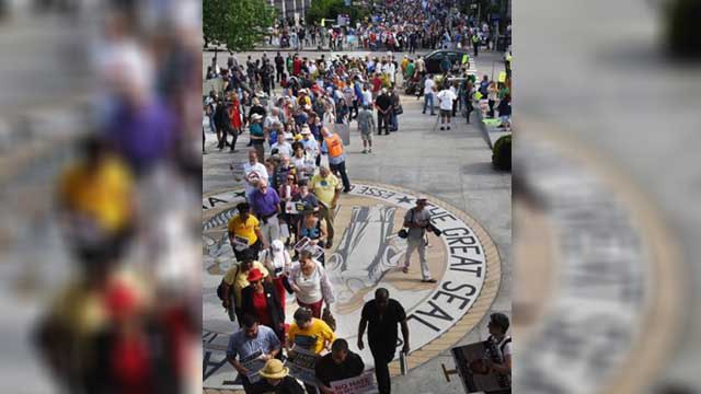 While demonstrations circled North Carolina's statehouse on Monday for and against a Republican-backed law curtailing protectio