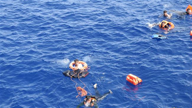 25 2016 by the Italian Navy shows a rescue operation during the shipwreck of an overcrowded boat of refugees off the Libyan coast