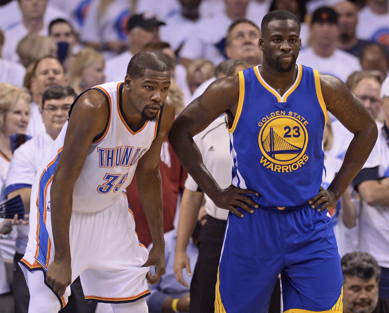 May 24 2016 Oklahoma City OK USA Golden State Warriors forward Draymond Green 23 and Oklahoma City Thunder forward Kevin Durant 35 react during the first quarter in game four of the Western conference finals of the NBA Playoffs at Chesapeake Energy Arena