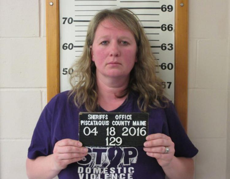 Emily Wilson 38 was arrested on domestic violence charges while wearing an anti-domestic violence shirt