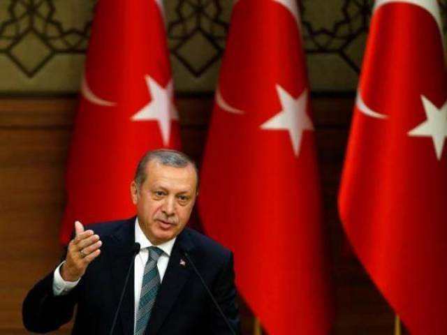 Turkish President Tayyip Erdogan makes a speech during his meeting with mukhtars at the Presidential Palace in Ankara Turkey