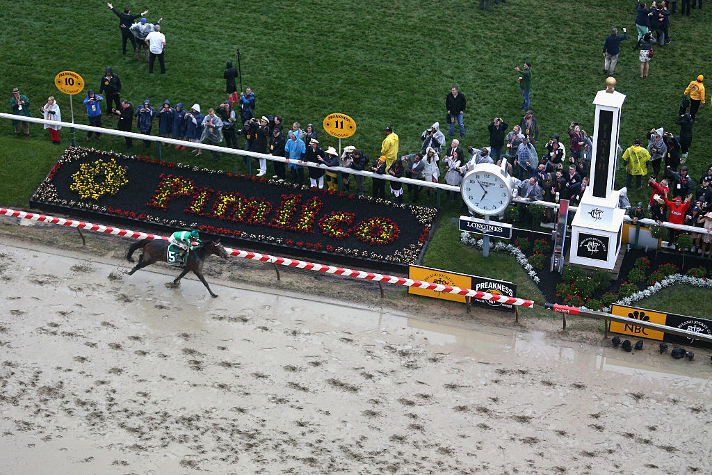 BALTIMORE MD- MAY 21 Exaggerator ridden by Kent Desormeaux leads the field to win the 141st running of the Preakness Stakes at Pimlico Race Course