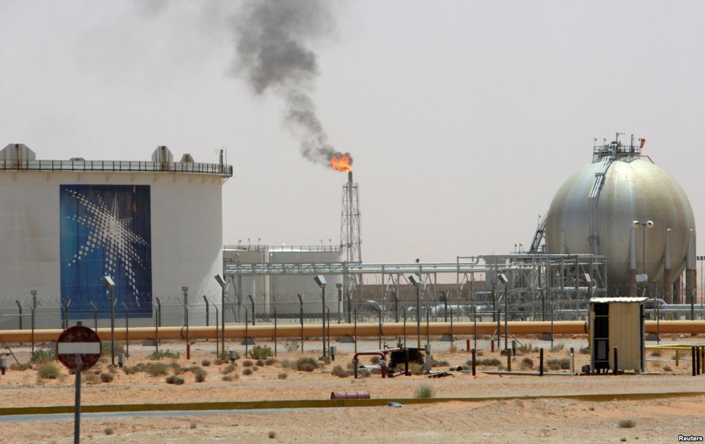 FILE- A gas flame is seen in the desert near the Khurais oilfield about 160 km from Riyadh Saudi Arabia