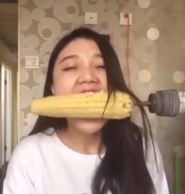 Facebook
Woman has hair ripped out after trying to eat corn on the cob off spinning drill