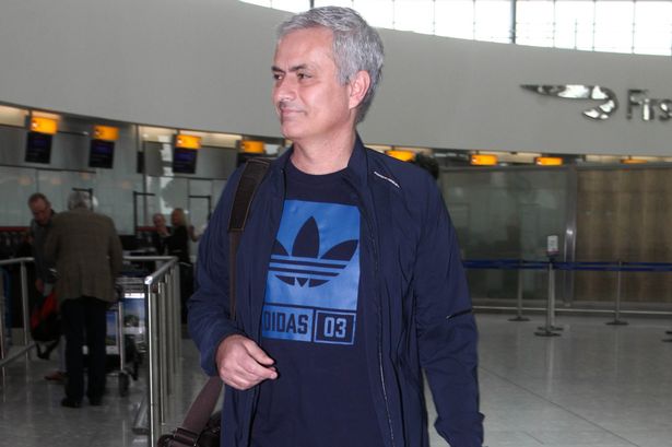 Jose Mourinho is seen at Terminal 5 in Heathrow Airport on his way to Mexico