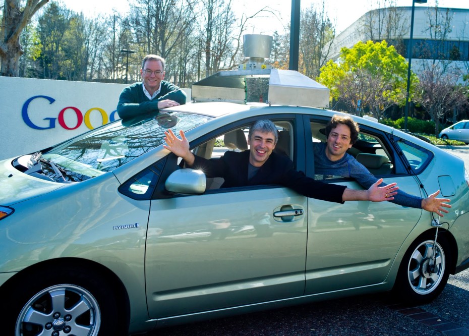 Google executive chairman Eric Schmidt left with Google cofounders Larry Page and Sergey Brin in a Google self-driving car in 2011