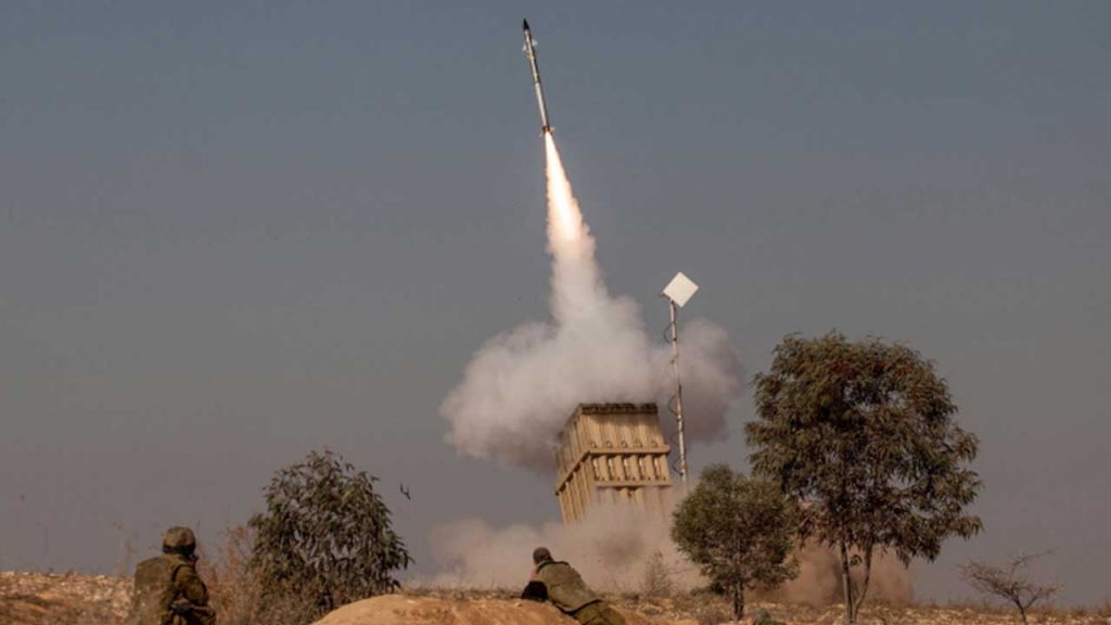 A volley of rockets fired from the Gaza Strip iintercepted by the Iron Dome system near the Israeli town of Beersheba