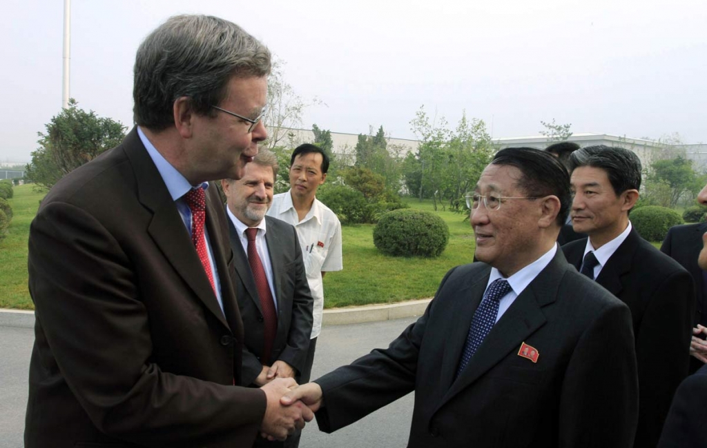 North Korea's Kang Sok Ju right a member of the Political Bureau of the Central Committee of the Workers&#039 Party of Korea and secretary of the WPK shakes hands with German Ambassador to North Korea Thoma