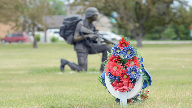 Floral arrangements began to fill Greenwood Cemetery Friday afternoon in preparation for Memorial Day on Monday